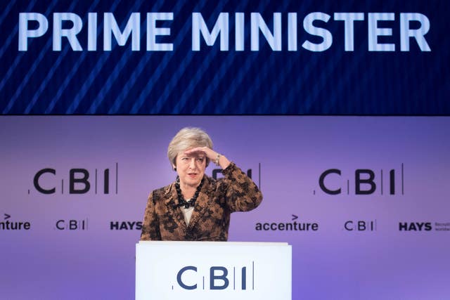 Theresa May defended her Brexit plans to business chiefs at the CBI conference (Stefan Rousseau/PA)