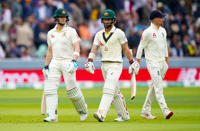 Steve Smith, left, remains at the crease alongside Matthew Wade