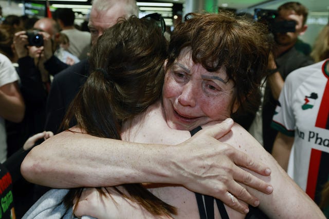Dr Margaret Connolly embracing her daughter Katie at Dublin Airport