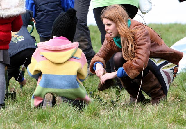 Princess Beatrice of York planted tree saplings with children during her visit to Heartwood (Chris Radburn/PA)