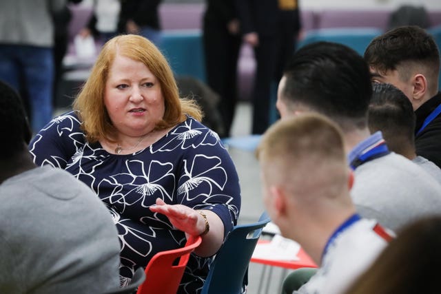 Naomi Long during a visit to Hydebank Wood