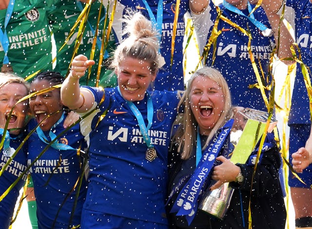 Emma Hayes and Millie Bright celebrating with the WSL trophy