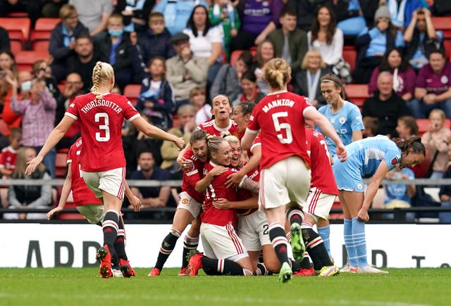 Manchester United''s players celebrate Alessia Russo''s goal