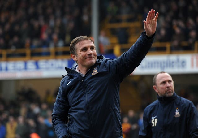 Bradford manager Phil Parkinson waves to fans 