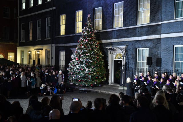 The Military Wives Choir sing carols outside Number 10 (Dominic Lipinski/PA)