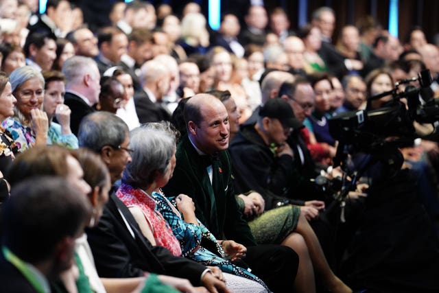 The Prince of Wales (centre) speaks to guests as he takes his seat for the 2023 Earthshot Prize awards ceremony. 