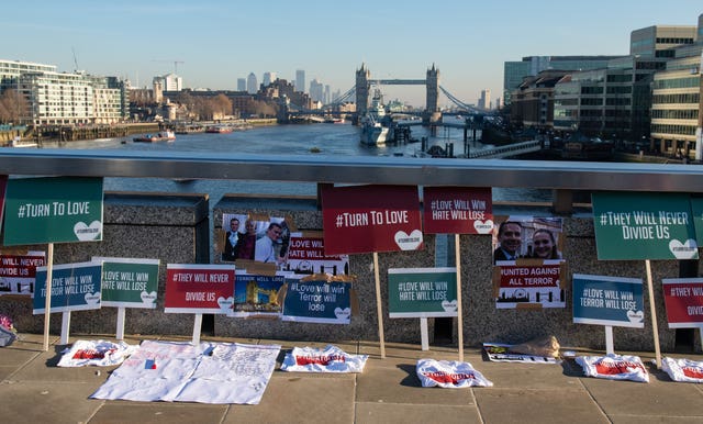 Placards and photos on London Bridge for the victims of the London Bridge terrorist attack