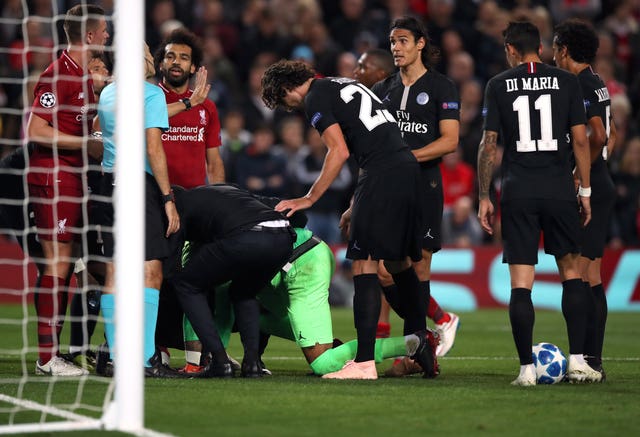 Paris St Germain goalkeeper Alphonse Areola receives treatment after Mohamed Salah''s disallowed goal