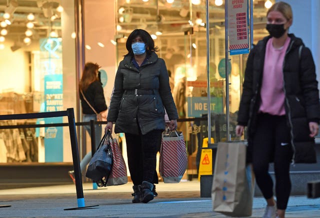 Shoppers leaving Primark in Birmingham (Jacob King/PA)