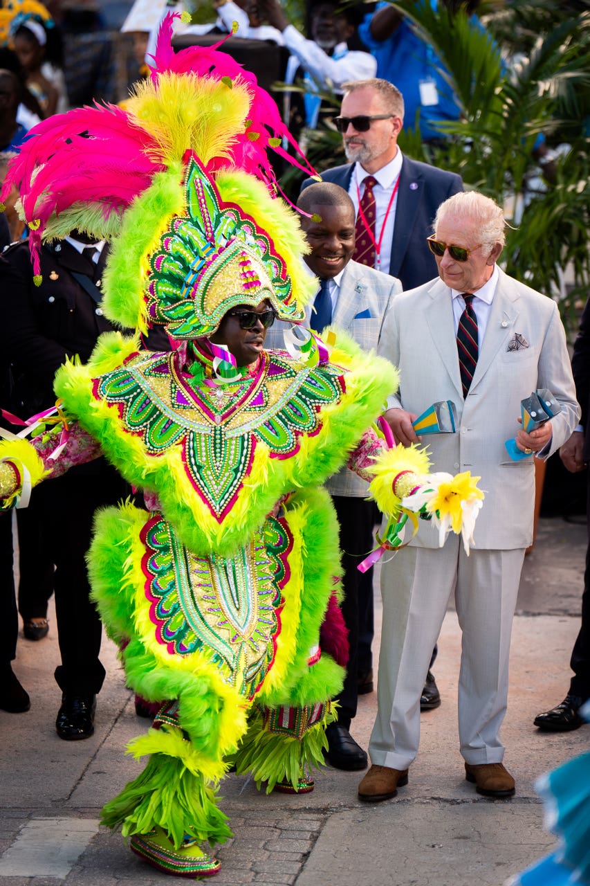 Charles shakes maracas and joins dancers in carnival parade | Falmouth ...