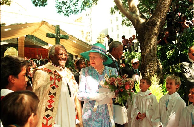 Archbishop Desmond Tutu with Queen Elizabeth nearby St George’s Cathedral in Cape Town