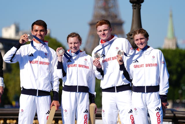 Alex Yee, Georgia Taylor-Brown, Samuel Dickinson and Beth Potter celebrate with their bronze medals