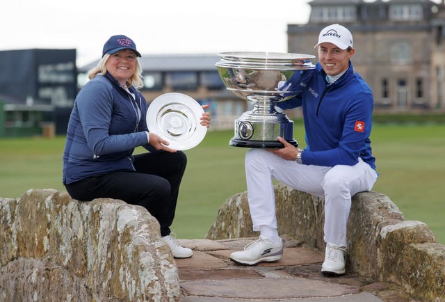 Susan and Matt Fitzpatrick pose with their trophies on the Swilcan Bridge