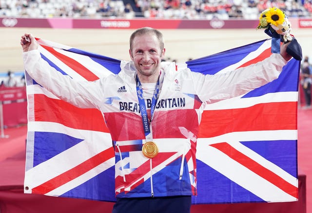 Great Britain’s Jason Kenny celebrates with the gold medal in the Men’s Keirin at the Tokyo 2020 Olympic Games