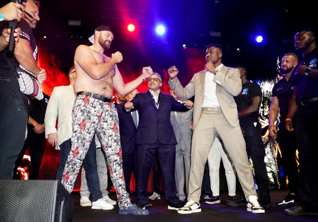 Francis Ngannou, right, has never boxed professionally before (James Manning/PA)