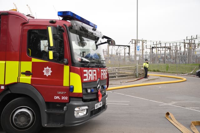 A fire engine in front of a substation