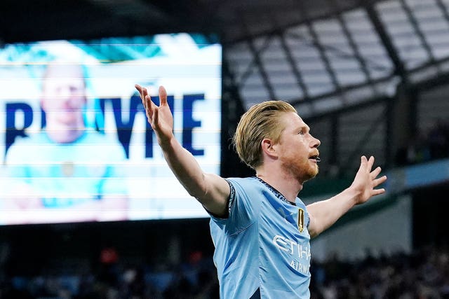 Kevin De Bruyne spreads his arms to celebrate scoring a goal for Manchester City