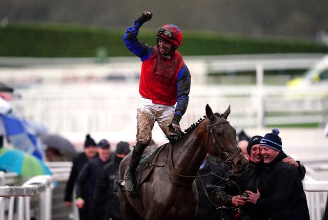 Patrick Mullins celebrates after winning the Champion Bumper on Facile Vega