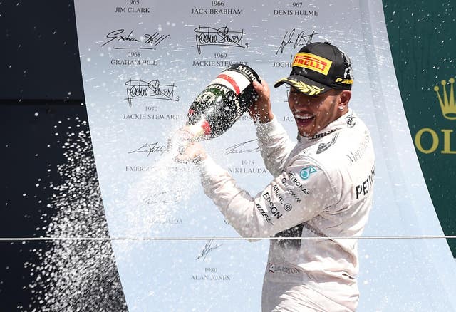 Lewis Hamilton celebrates winning the 2015 British Grand Prix