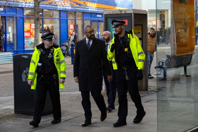 Home Secretary James Cleverly accompanies police officers on a foot patrol on Gravesend High Street during a visit to Kent for an announcement on zombie knives legislation