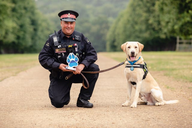 Pc Colin Nash and two-year-old labrador Elvis