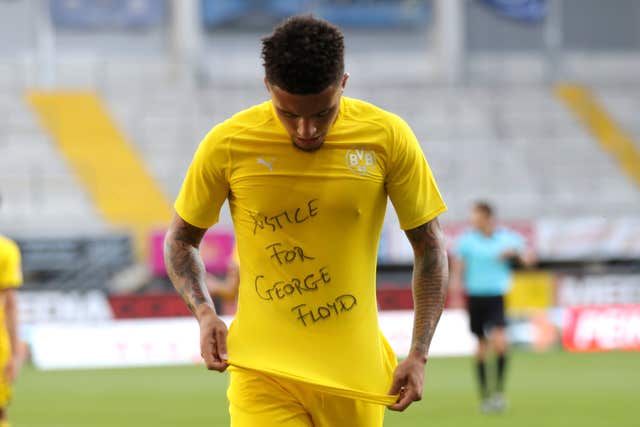 Jadon Sancho after scoring for Borussia Dortmund