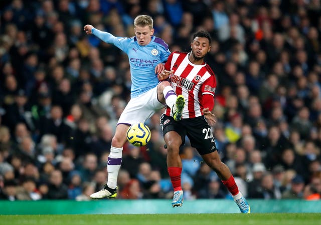 Oleksandr Zinchenko (left) in action against Sheffield United’s Lys Mousset