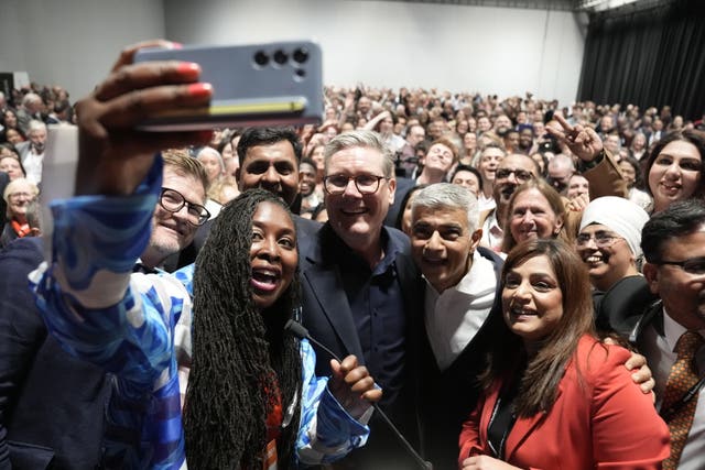 Labour MP Dawn Butler takes a selfie with Sir Keir Starmer, Sadiq Khan and a crowd of Labour members