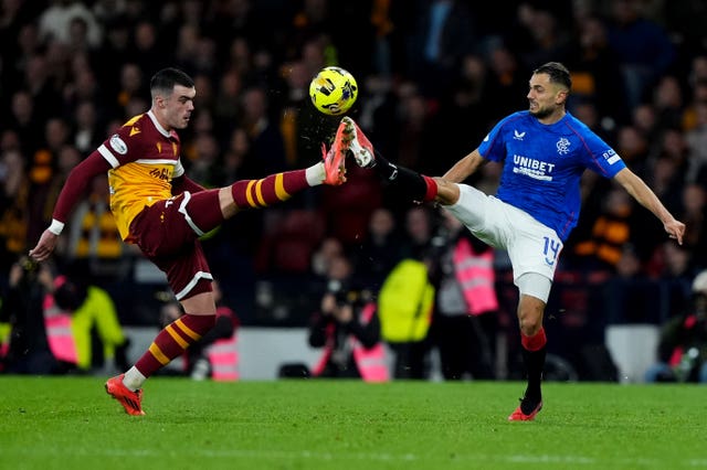 Lennon Miller controls a high ball against Rangers