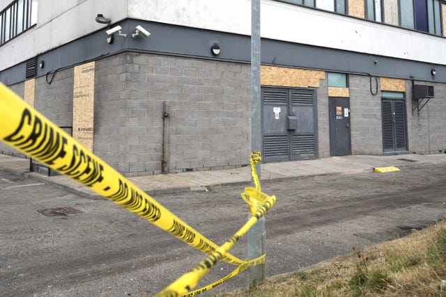 Yellow crime scene tape around the Holiday Inn Express in Rotherham