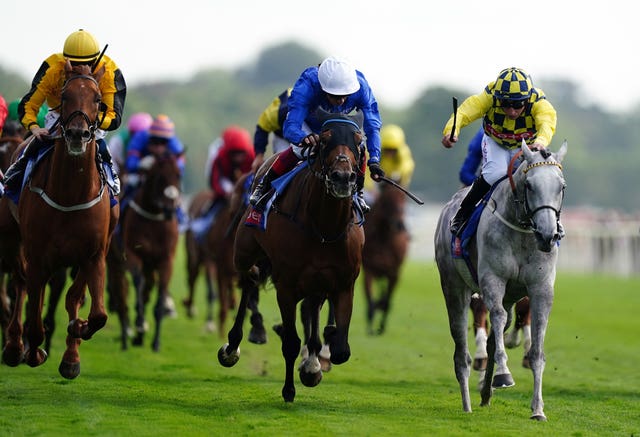 Trawlerman (white hat) was given a peach by Frankie Dettori to win the Ebor 