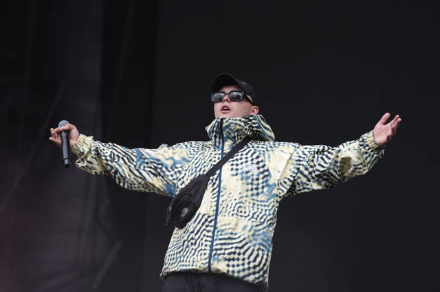 Mo Chara from Kneecap performing on stage