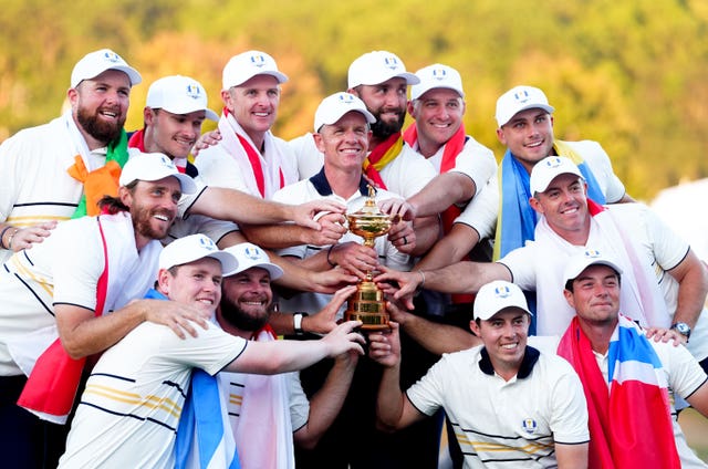 Team Europe players and captain Luke Donald (centre) with the Ryder Cup trophy
