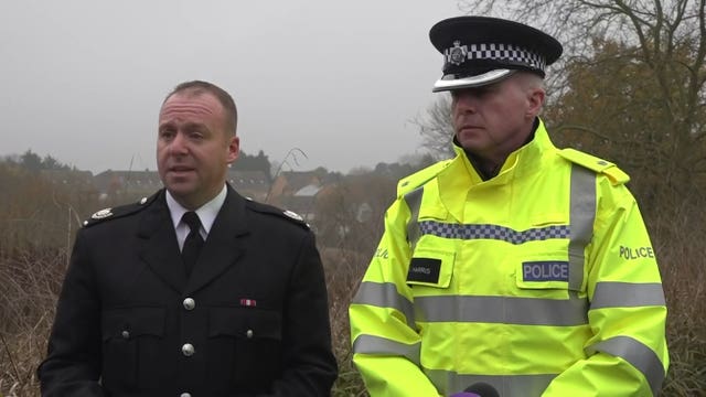 West Midlands Fire Service area commander Richard Stanton, left, and Superintendent Richard Harris, of West Midlands Police, speak to the media at the scene in Babbs Mill Park in Kingshurst, Solihull