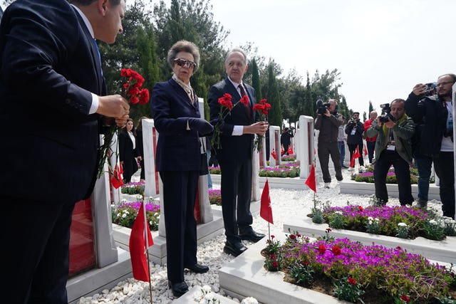 The Princess Royal with Gokhan Yazgi, Turkey’s deputy minister for culture, laying red carnations at the graves of Turkish soldiers at Canakkale Martyrs’ Memorial in the Gallipoli Peninsula Historical National Park