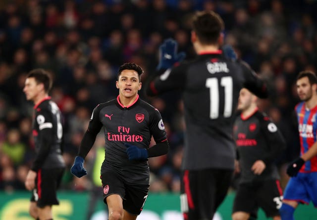 Alexis Sanchez celebrates scoring for Arsenal against Crystal Palace