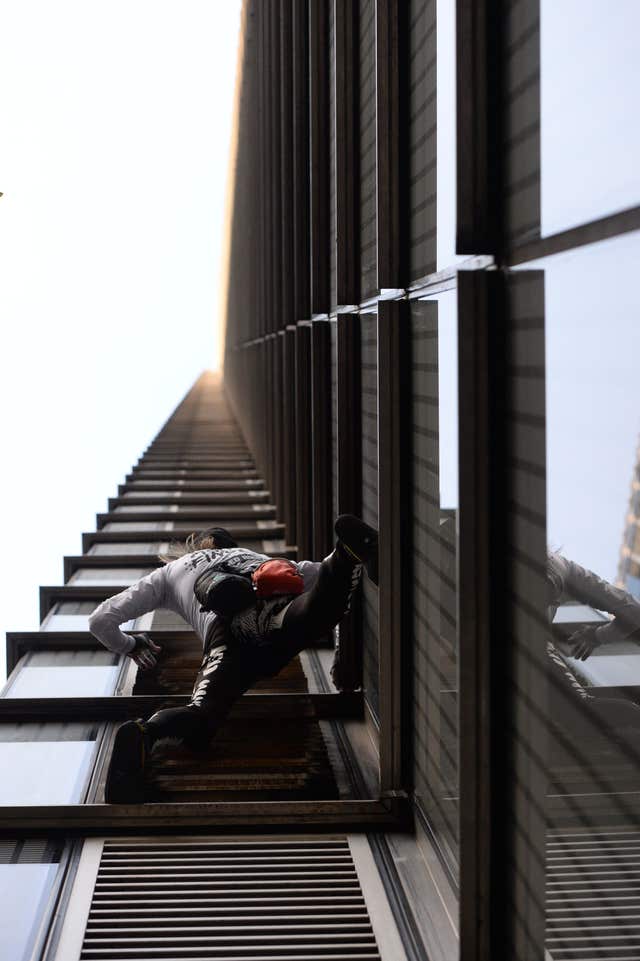 Alain Robert climbs Heron Tower