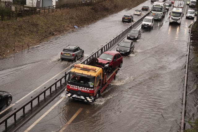 Traffic passes through water on the A66 near Bowes in County Durham 
