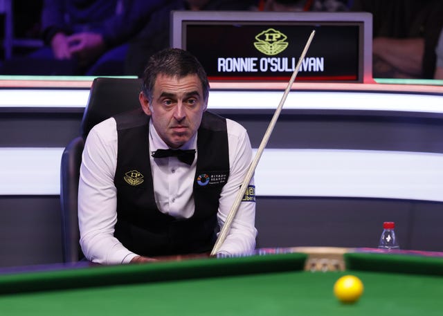 Ronnie O’Sullivan frowns in his chair during his UK Championship match against Barry Hawkins