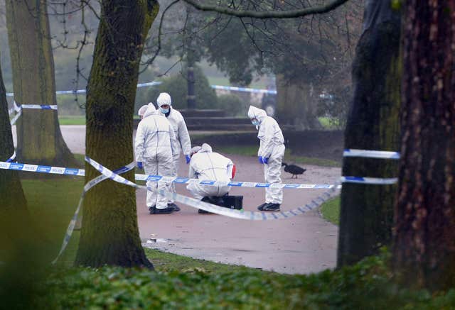 Forensic officers at the scene in West Park (PA)