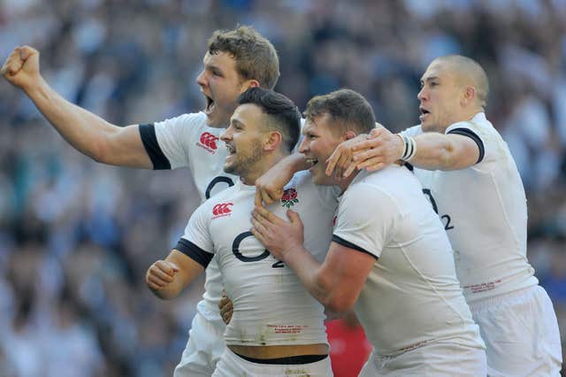 Danny Care celebrates scoring a try against Scotland