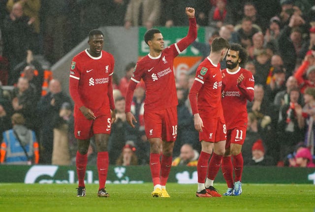 Cody Gakpo celebrates Liverpool''s third goal 