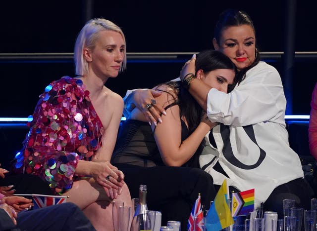 UK entrant Mae Muller (centre) reacts during voting