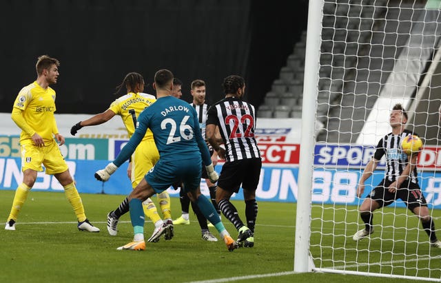 Matt Ritchie, right, scored an unfortunate own goal to give the lead to Fulham