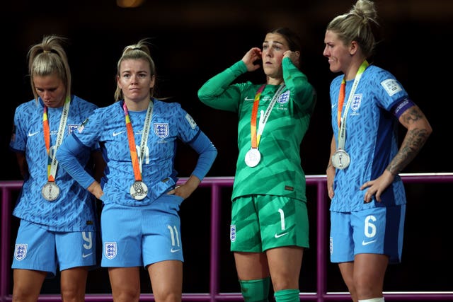 Bright, far right, pictured with Hemp, second left and Earps, third left, after the World Cup final in Sydney. Rachel Daly is on the far left