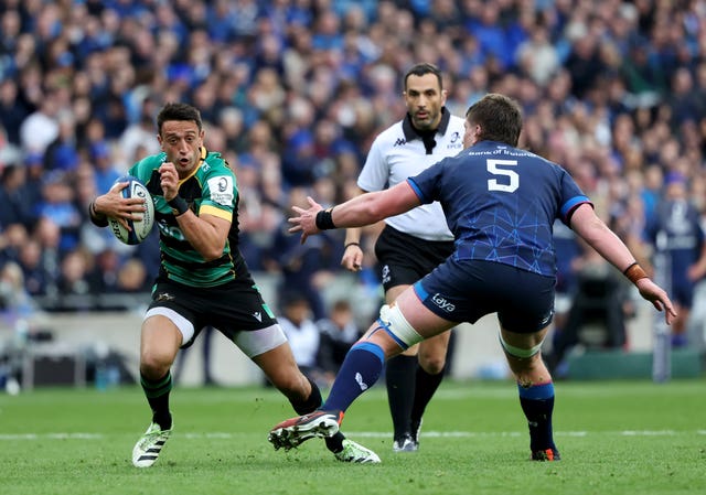 Northampton's Alex Mitchell, left, evades a tackle from Leinster’s Joe McCarthy during the Investec Champions Cup semi-final