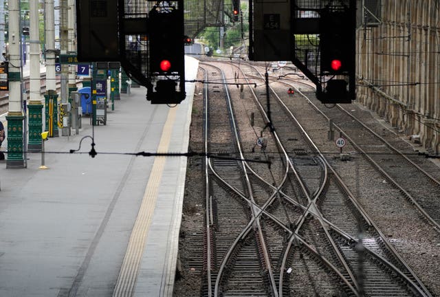 A quiet platform at Waverley Station in Edinburgh (Andrew Milligan/PA)
