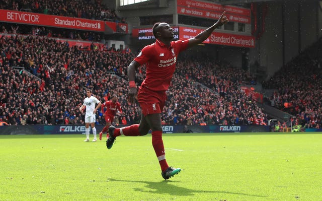 Sadio Mane scored twice as Liverpool kept up the pressure with a 4-2 victory at home to Burnley