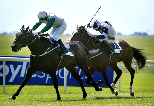 Attraction winning the Irish 1,000 Guineas