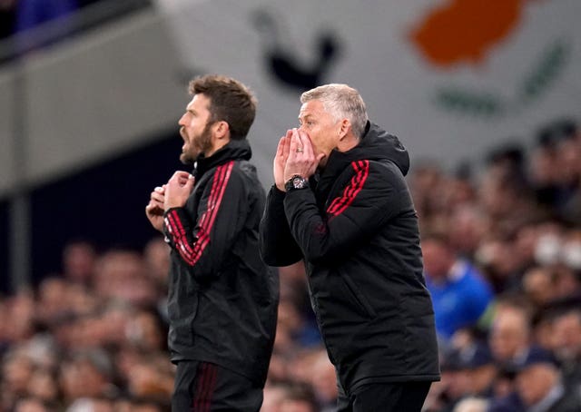Carrick (left) has been named as caretaker manager